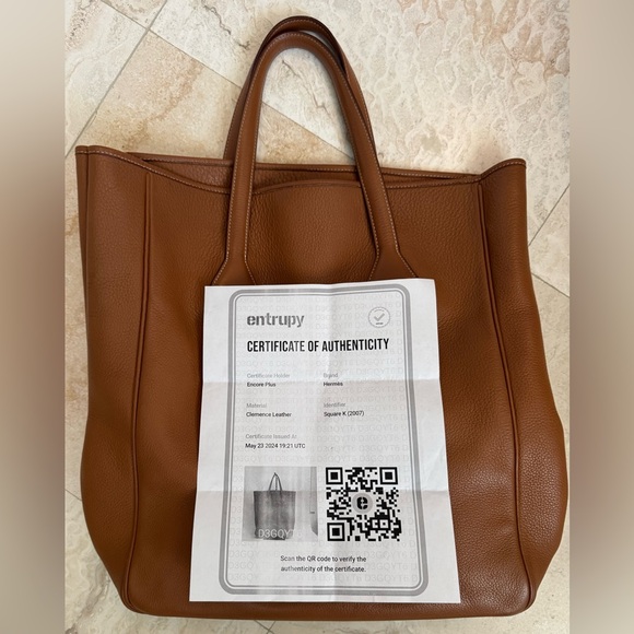Hermes Tan Leather Tote Bag
Approx 16.5” high X 6”deep X 13” wide 6” strap drop - Picture 4 of 10